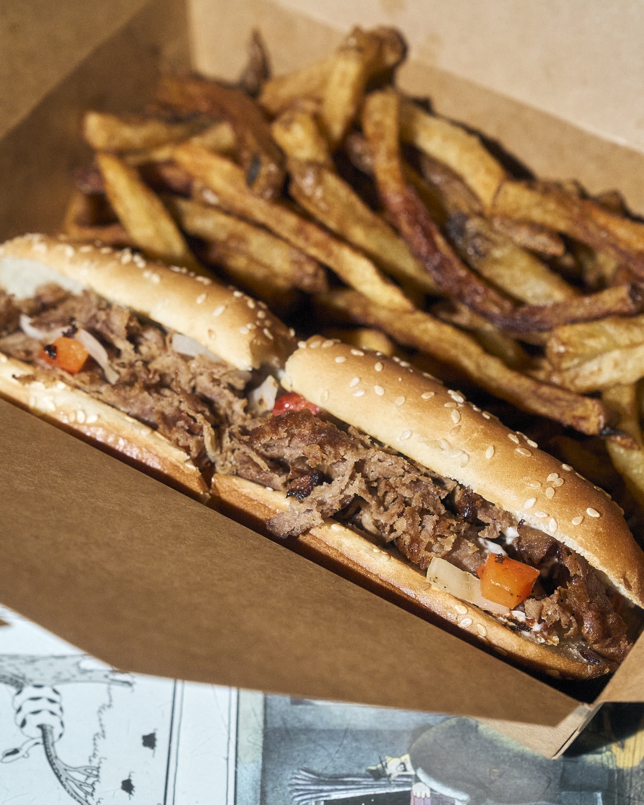 ZED*80 steak sandwich served with fries