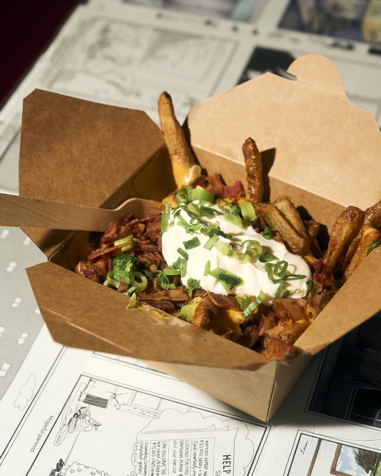 ZED*80 Power-Up Fries topped with cheese, bacon, sour cream and green onion