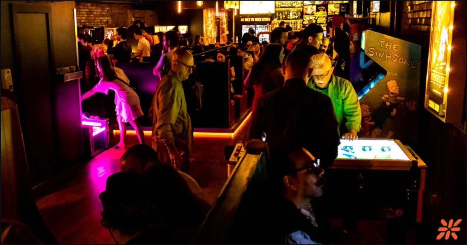 The ZED*80 arcade humming with players at night